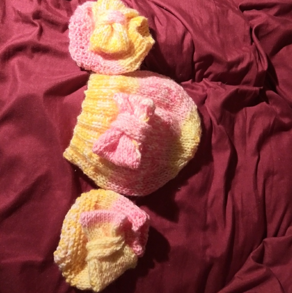 Hand knitted baby hat and booties